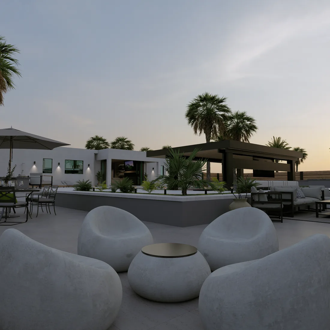 Sculptural outdoor lounge chairs on a pool terrace at sunset.