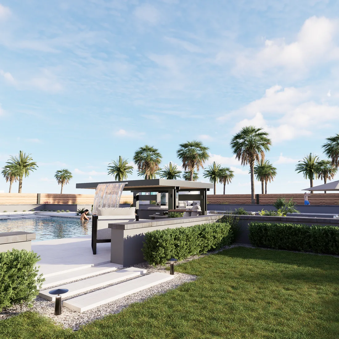 A wide view across the pool deck and lawn toward the cabana and palms.